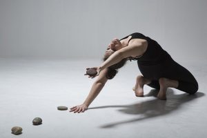 Skin/Space/Stone. Choreographer/Director: Sasha Roubicek Dancer: Renee Stewart. Photographer: Hugo Glendinning